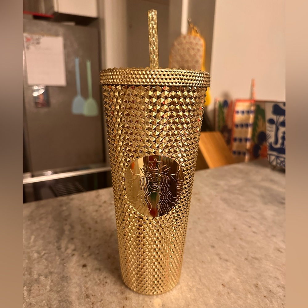 Starbucks's venti 2022 studded gold tumbler